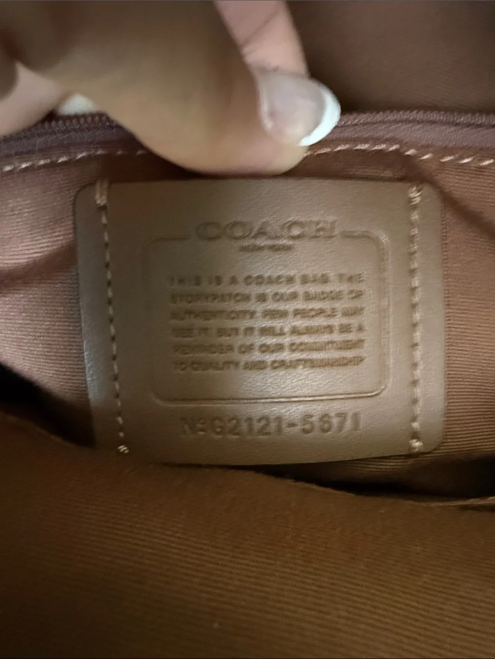 Coach Brown Signature Leather Backpack with gold hardware